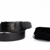 a personalised black belt with a engraved buckle