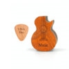 a engraved wooden guitar shaped box with a engraved pick