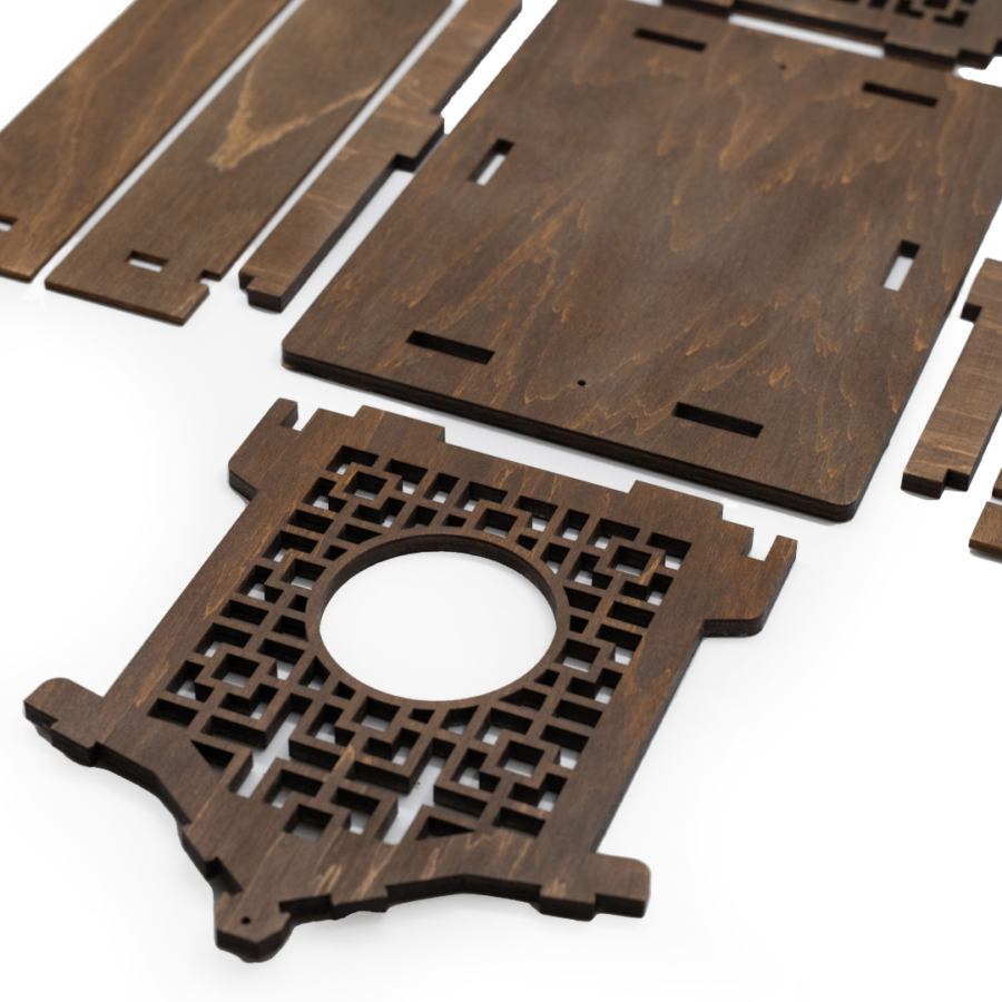a wooden azia style bird feeder