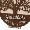 a wooden family tree with engraved hearts