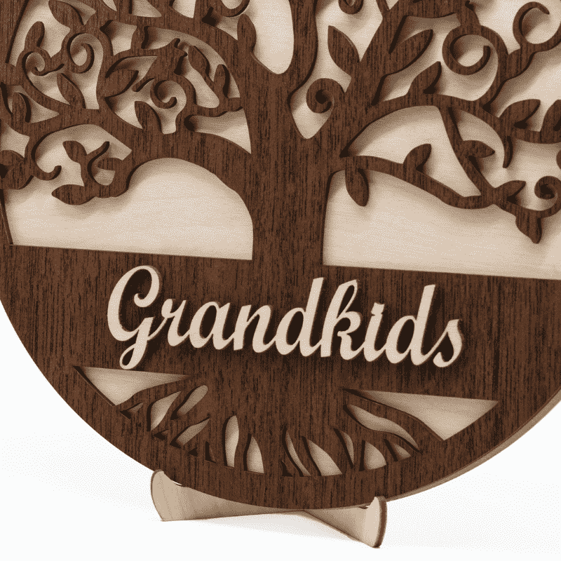 a wooden family tree with engraved hearts