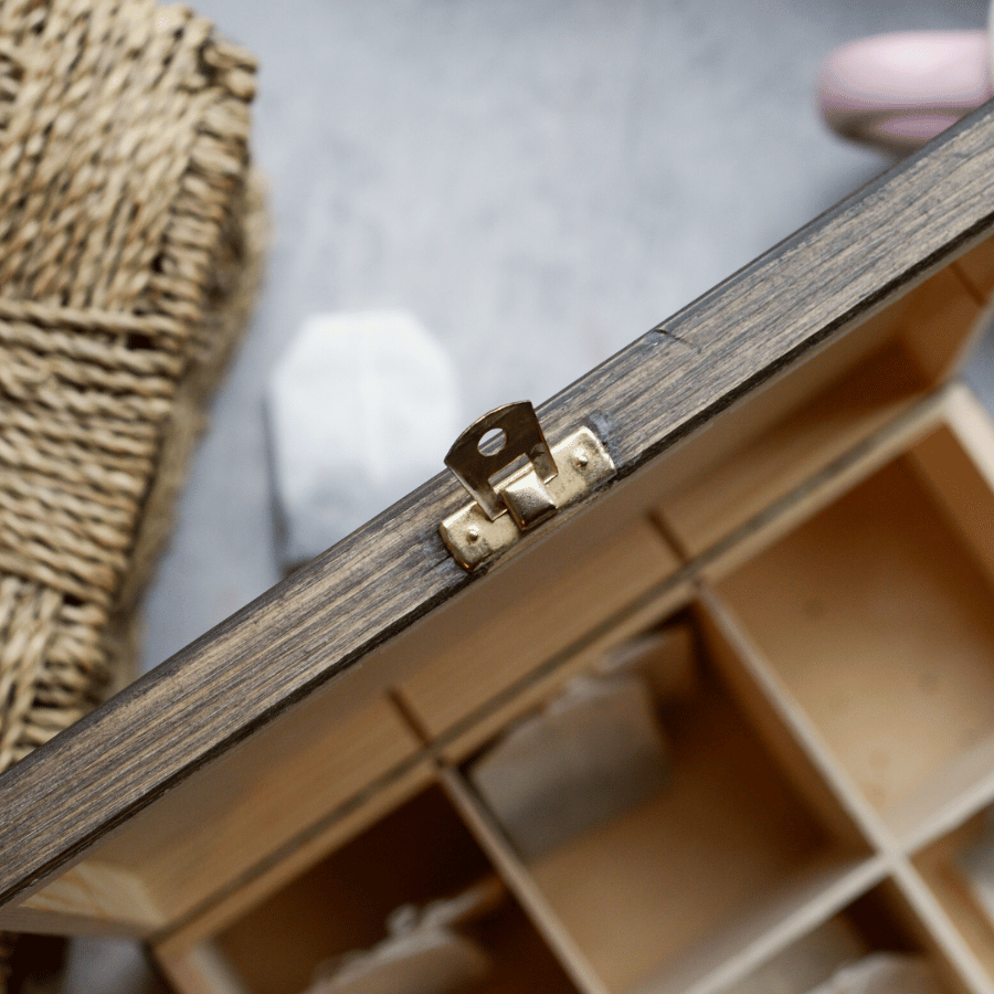 a wooden box with a small open lid