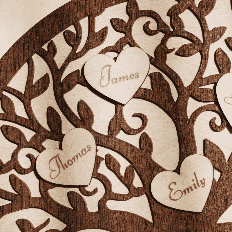 a wooden family tree with engraved hearts
