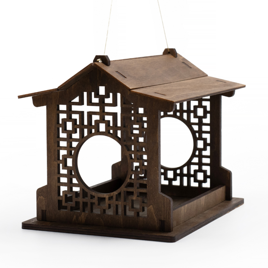 a wooden azia style bird feeder