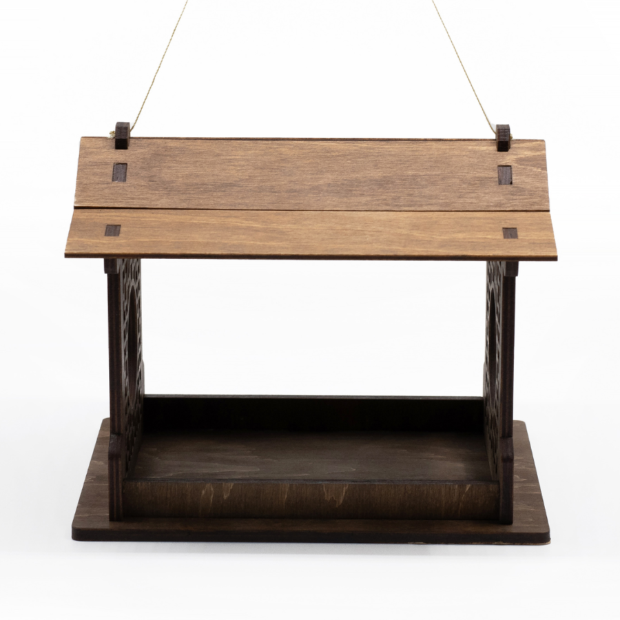 a wooden azia style bird feeder