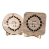 a pair of personalised wooden baby tooth boxes with engraved lids