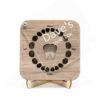 a wooden baby tooth box with an engraved lid