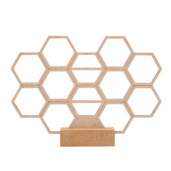 a wooden honeycomb earring holder