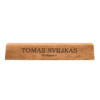 a personalized wooden nameplate with engraved name
