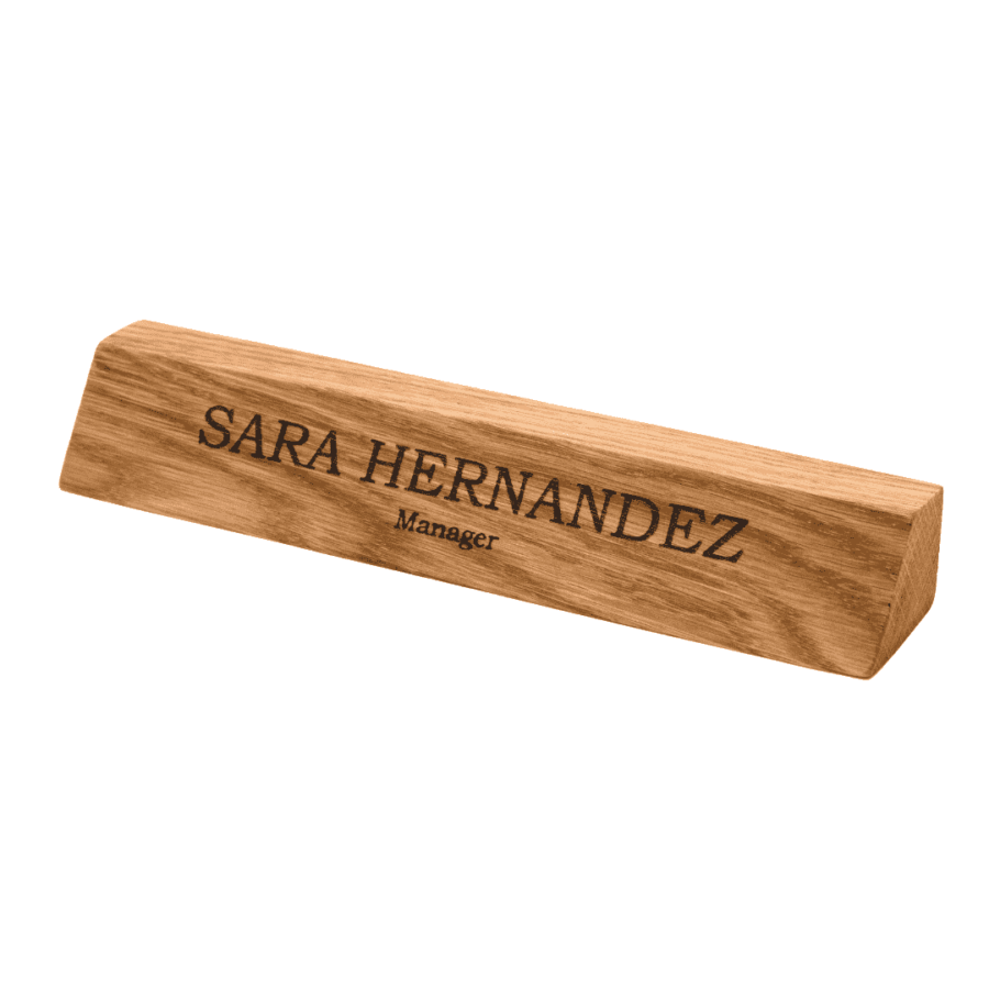 a personalized wooden nameplate with engraved name