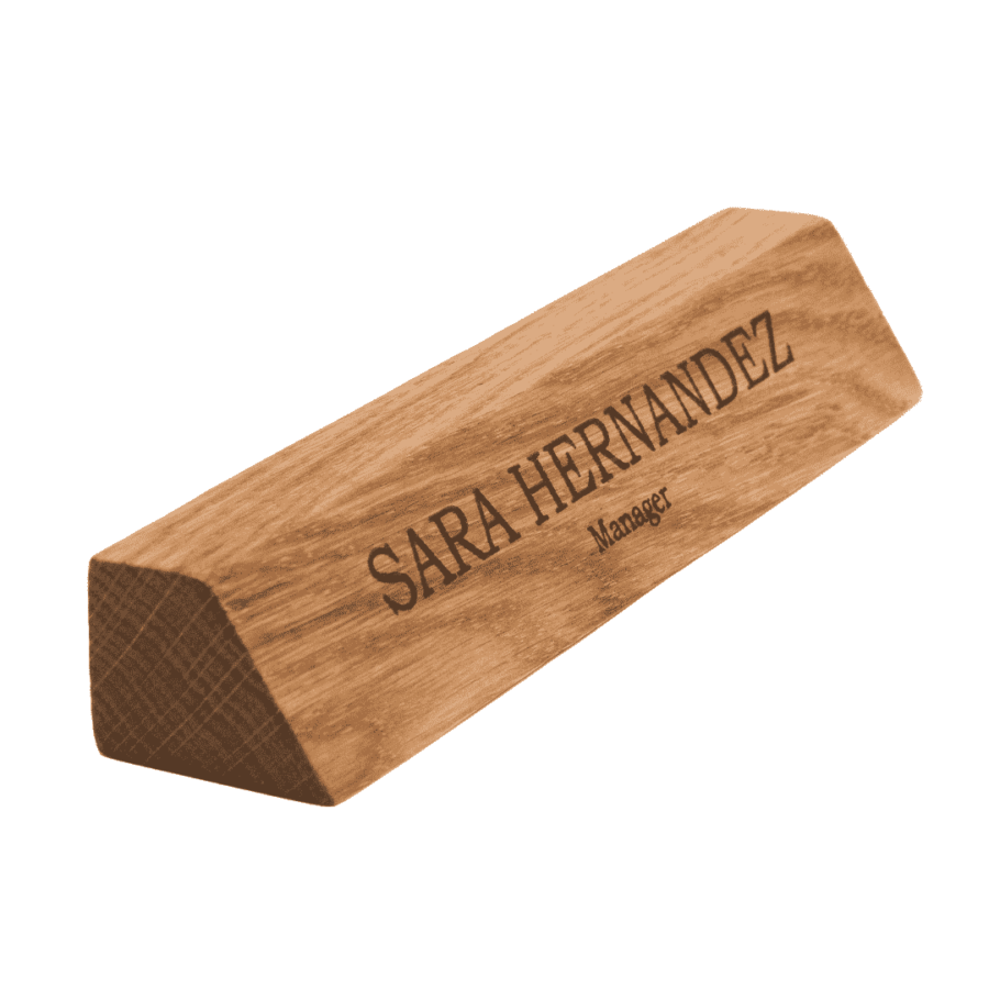 a wooden nameplate with engraved name