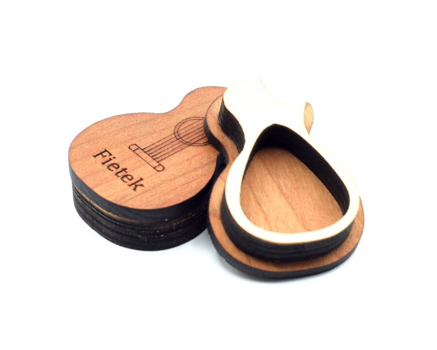 a wooden guitar shaped pick box