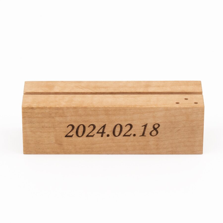 a wooden personalized photo holder